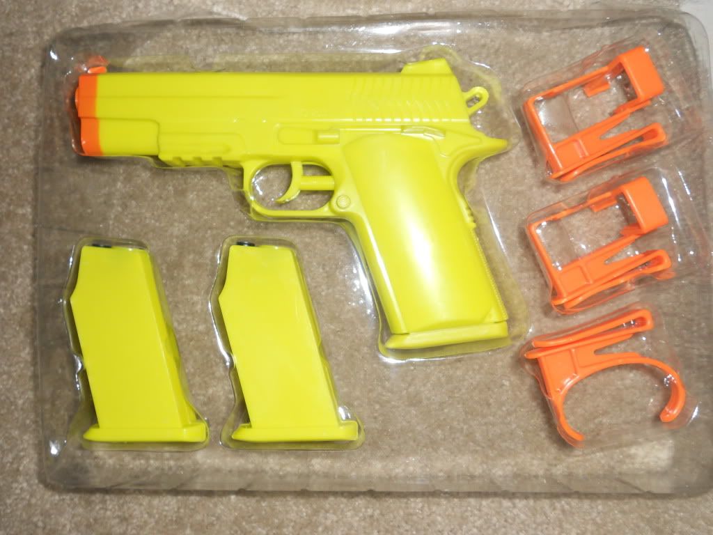 This water gun I bought came with magazines and holsters. r/pics